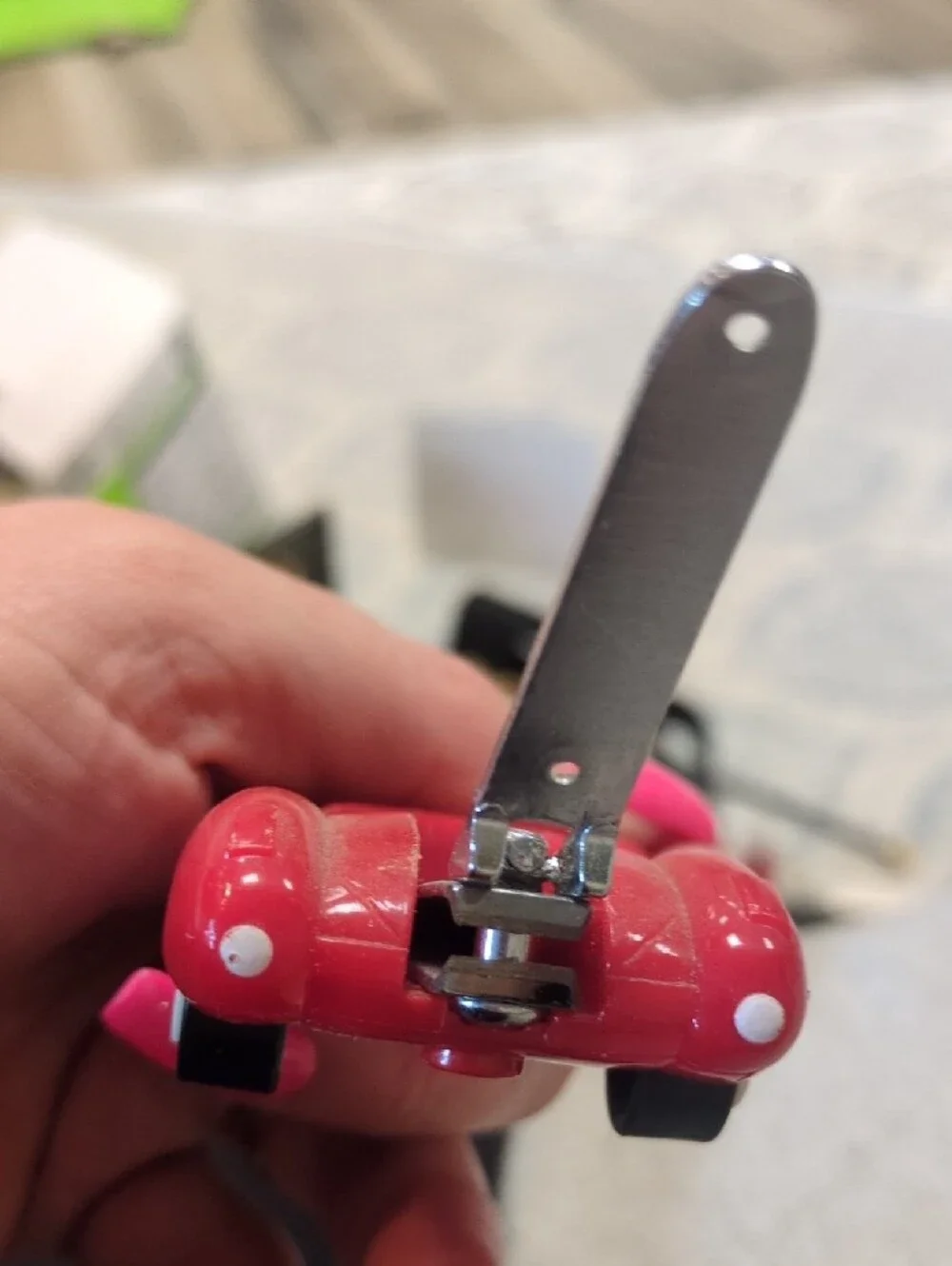 Red Wind-Up Kids Toy Car with Nail Clippers